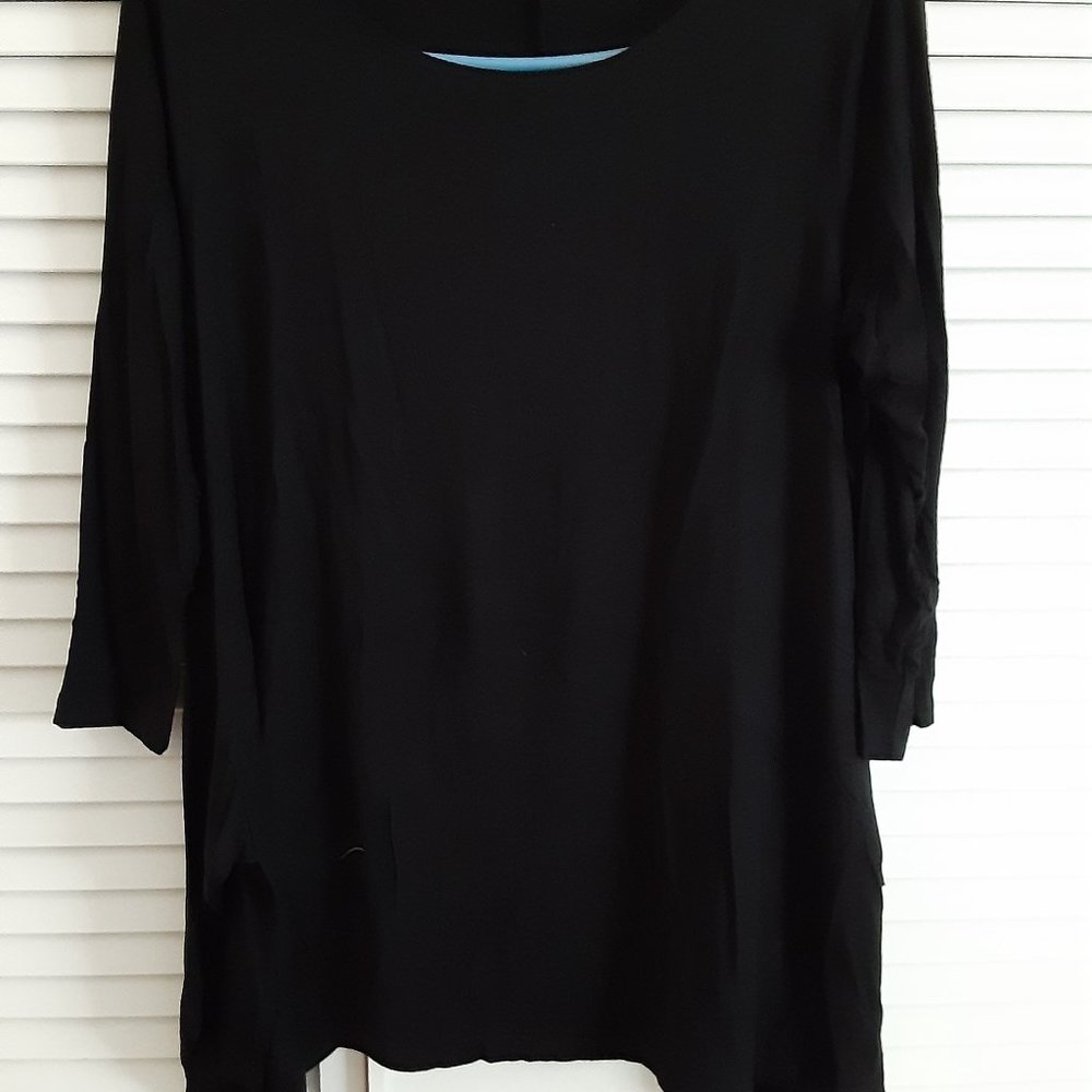 Oversized black jersey tunic.